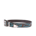 Turano Trail Silver close-up showing detailed floral embossing over vibrant turquoise leather inlay