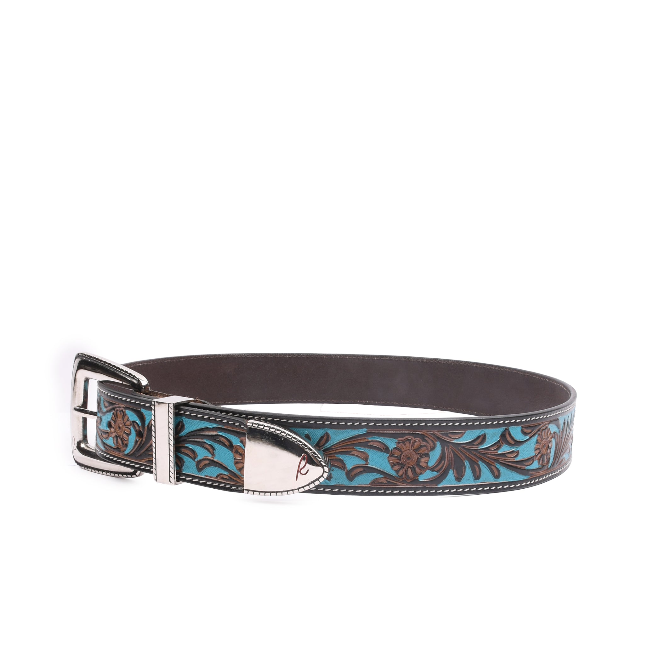 Turano Trail Silver close-up showing detailed floral embossing over vibrant turquoise leather inlay